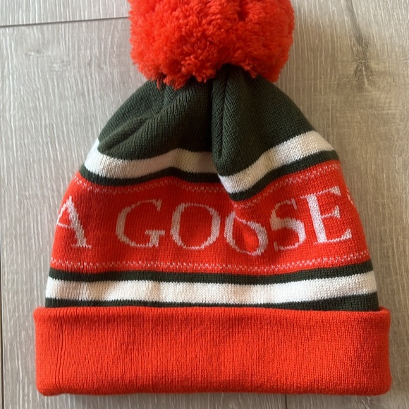 NWOT AUTHENTIC CANADA GOOSE 100% MERINO WOOL SKI BEANIE CLASSIC STYLE ORANGE/WHT - Picture 9 of 10